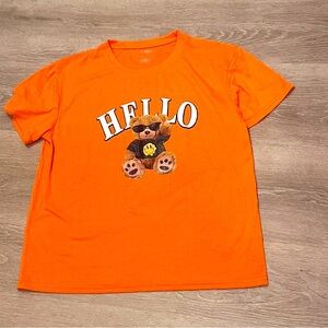 Orange graphic tee with bear print